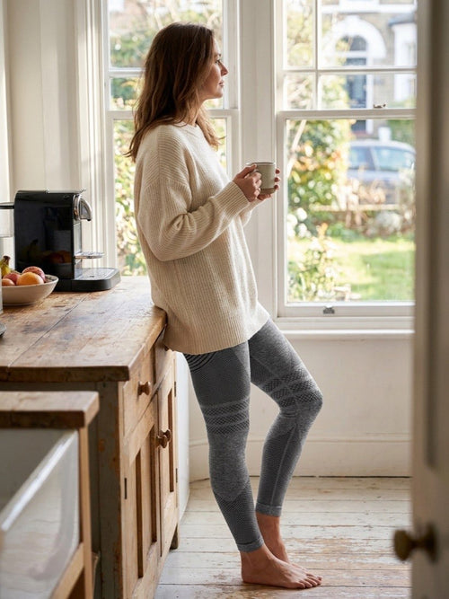 Woman wearing black high-waisted 3D compression leggings